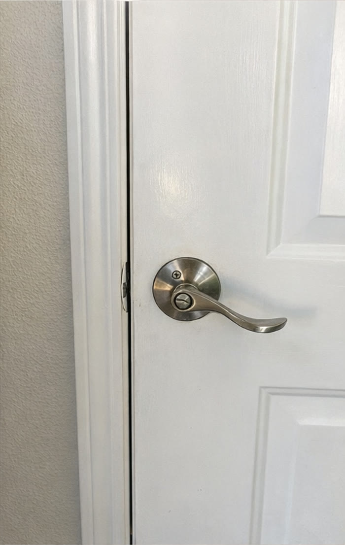 Clean white door and trim after detailed cleaning